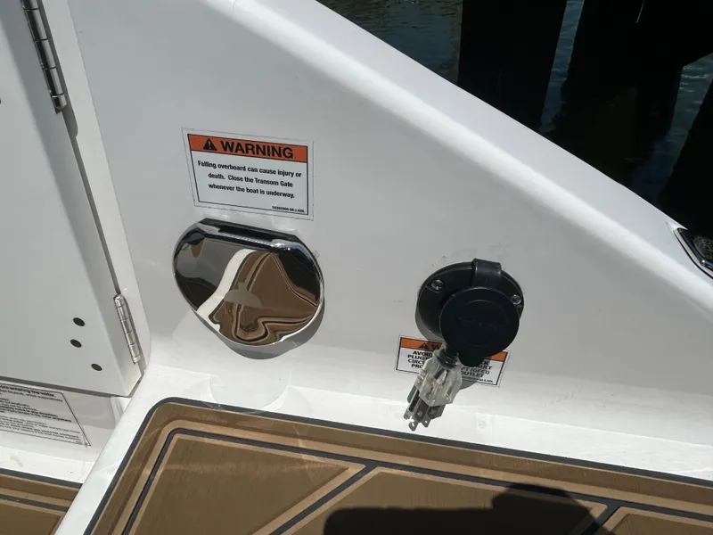 Slide: The Image of Monterey Elite 30 OB 2025 boat warning and connection. - 10