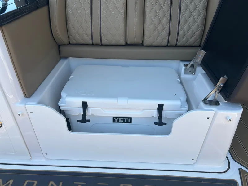 Slide: The Image of Yeti cooler in Monterey Elite 30 OB boat, 2025 model. - 15