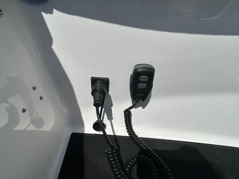 Slide: The Image of Control and connection on a 2025 Monterey Elite 30 OB boat. - 26