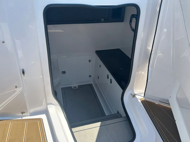 Slide: The Image of Interior of 2025 Monterey Elite 30 OB with storage space. - 27
