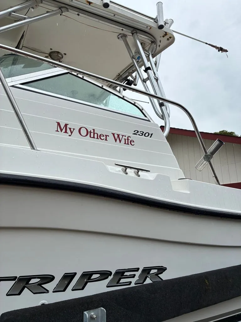 Slide: The Image of Seaswirl 2301 WA STRIPER boat with "My Other Wife" lettering. - 2