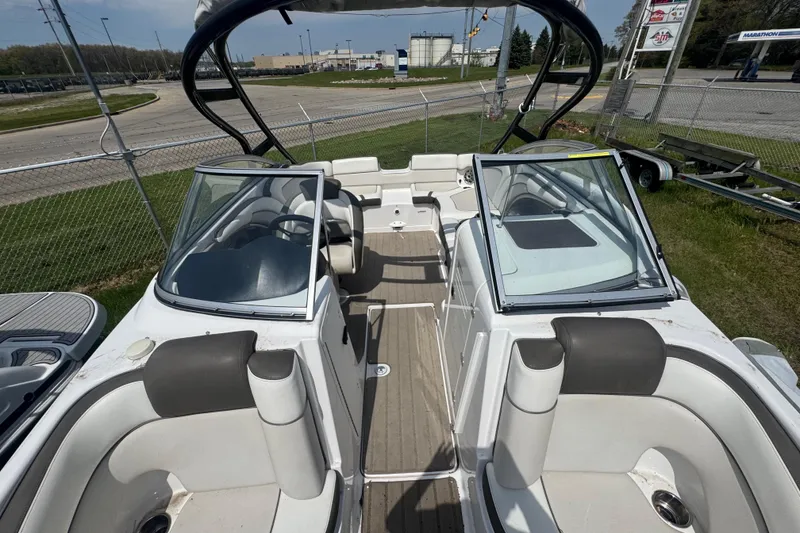 Slide: The Image of 2013 Yamaha Boats 242 Limited S interior with spacious seating and modern design. - 7