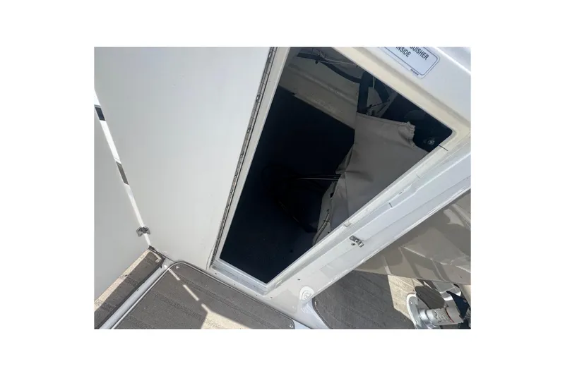 Slide: The Image of 2013 Yamaha Boats 242 Limited S dashboard with steering wheel and control panel. - 9