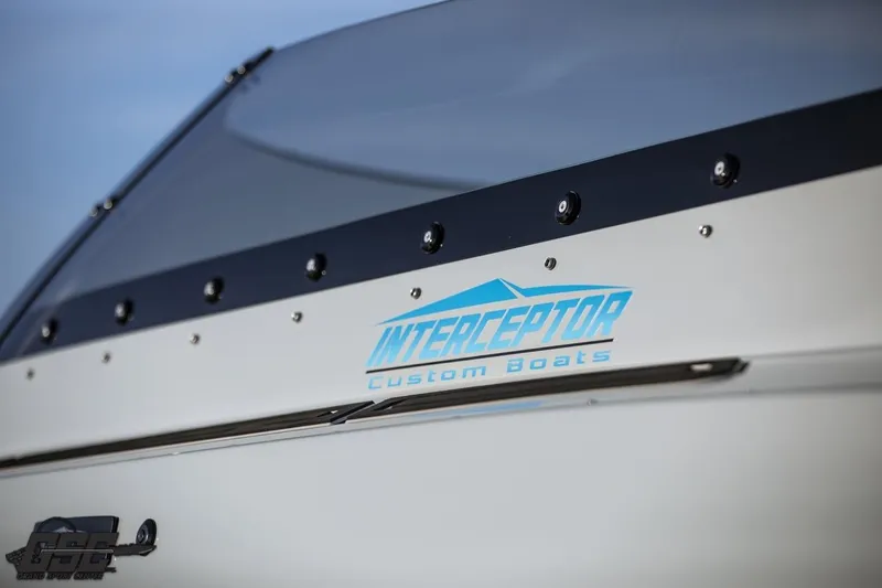 Slide: The Image of 2025 Interceptor 36 GTC boat with sleek design and custom branding. - 16