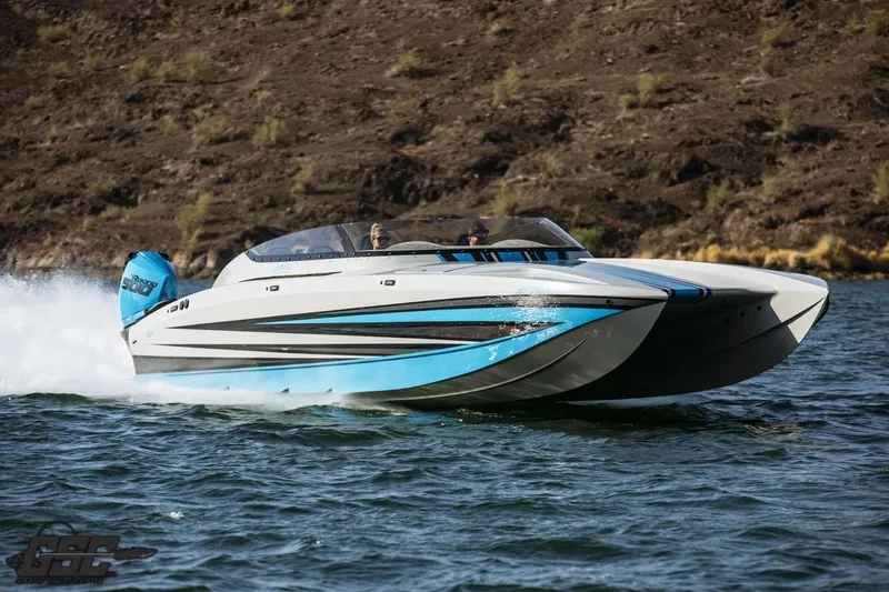 Slide: The Image of 2025 Interceptor 36 GTC speedboat cruising on water with sleek design and vibrant colors. - 17