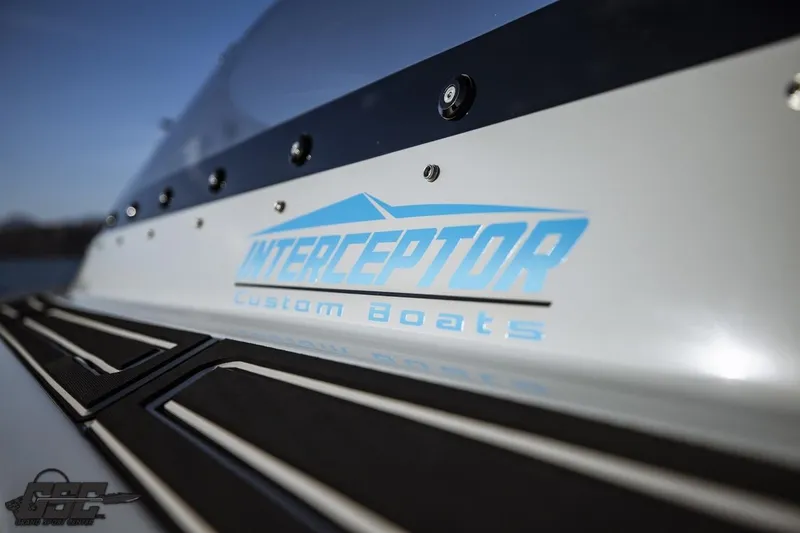 Slide: The Image of 2025 Interceptor 36 GTC boat with custom branding on the hull. - 23