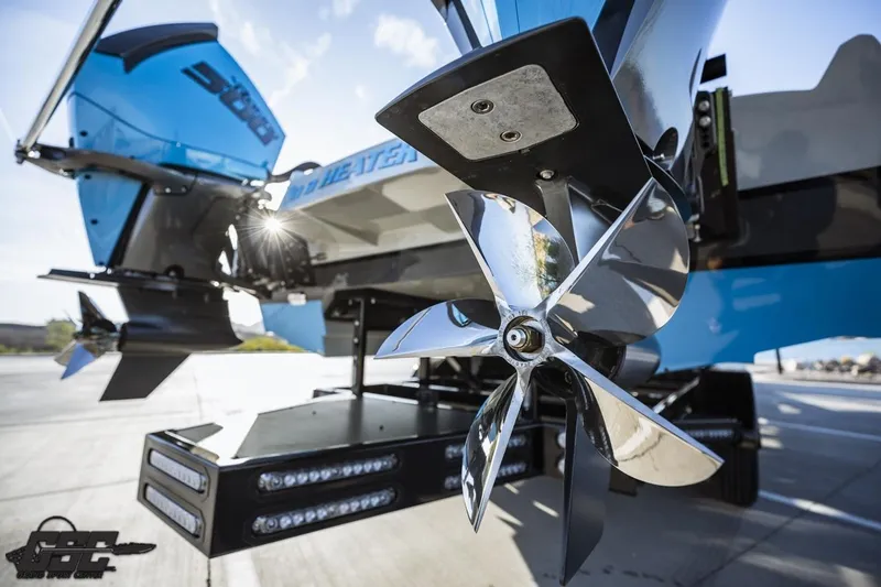 Slide: The Image of 2025 Interceptor 36 GTC boat propeller and engine detail in sunlight. - 24