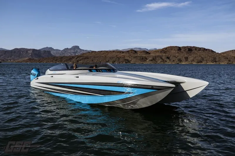 Slide: The Image of 2025 Interceptor 36 GTC powerboat on a scenic lake with mountainous backdrop. - 27