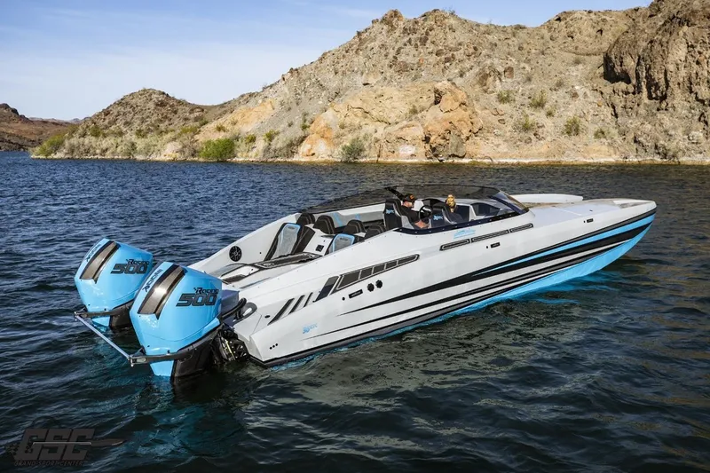 Slide: The Image of 2025 Interceptor 36 GTC boat with twin engines on a scenic lake. - 29
