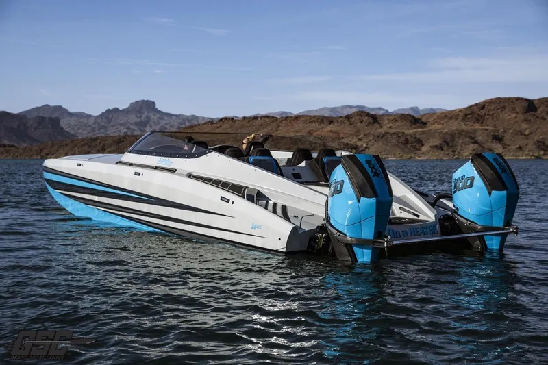 Slide: The Image of 2025 Interceptor 36 GTC boat with dual engines on a scenic lake backdrop. - 33