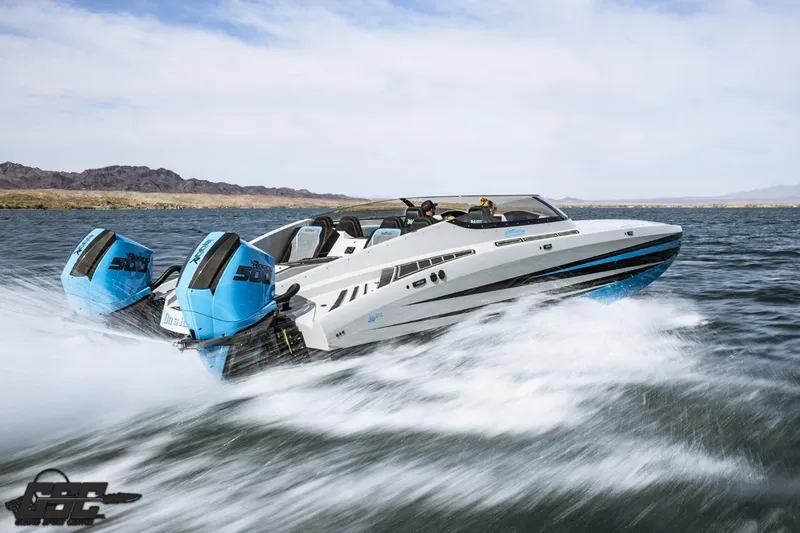 Slide: The Image of 2025 Interceptor 36 GTC speedboat cruising on open water with twin outboard engines. - 34