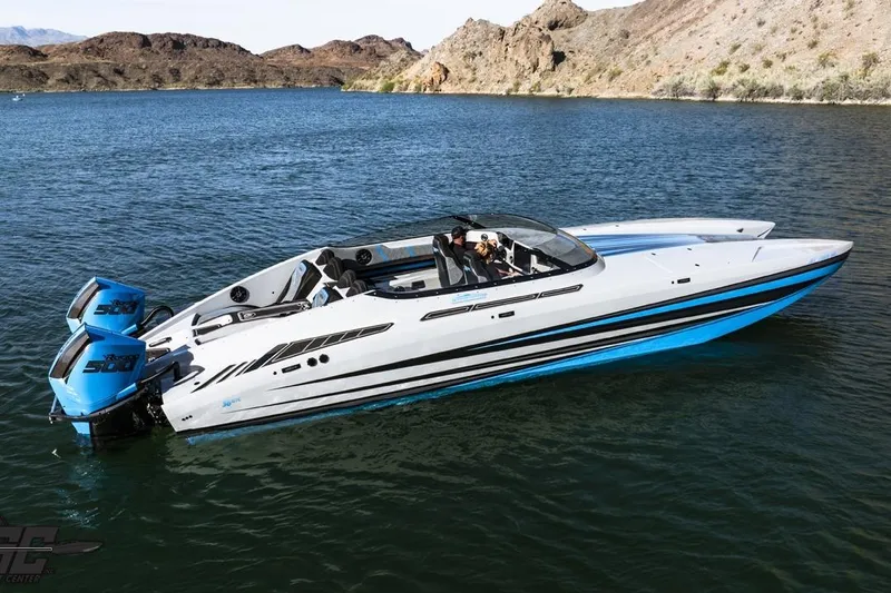 Slide: The Image of 2025 Interceptor 36 GTC speedboat on a serene lake with rocky hills in the background. - 4