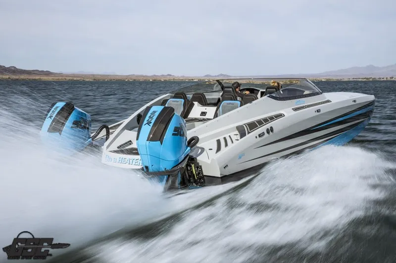 Slide: The Image of 2025 Interceptor 36 GTC speedboat cruising on open water with powerful engines. - 40