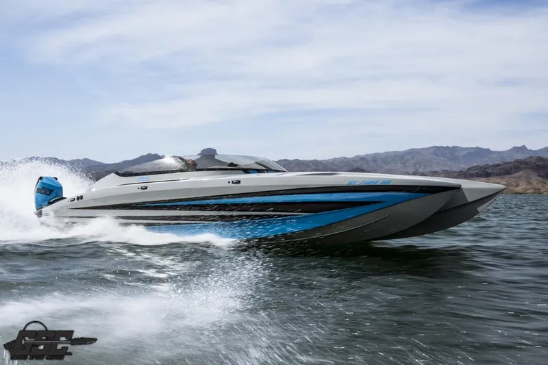 Slide: The Image of 2025 Interceptor 36 GTC speedboat cruising on open water with mountains in the background. - 41