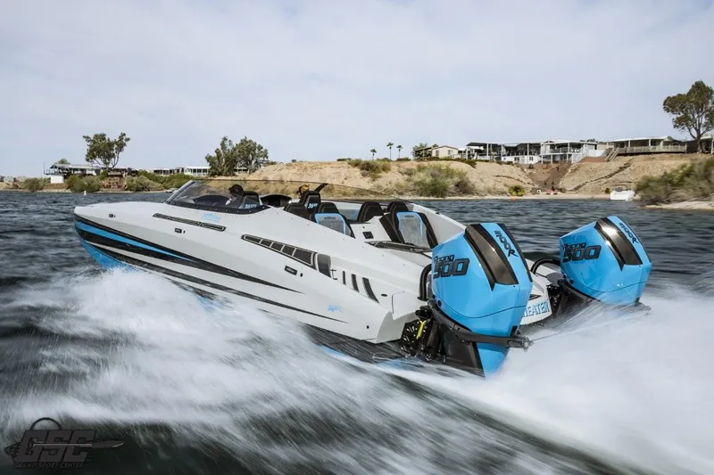 Slide: The Image of 2025 Interceptor 36 GTC speedboat with twin blue engines cruising on a river. - 45