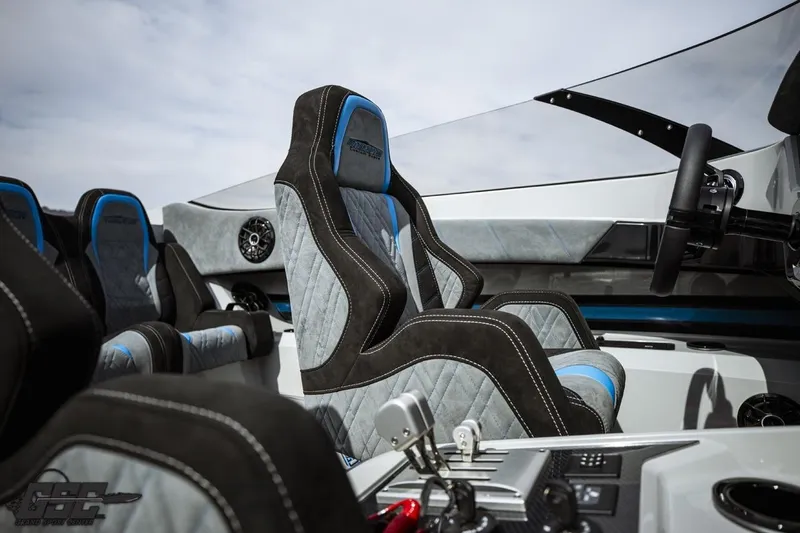 Slide: The Image of Interior of 2025 Interceptor 36 GTC boat with luxury seating and modern controls. - 57
