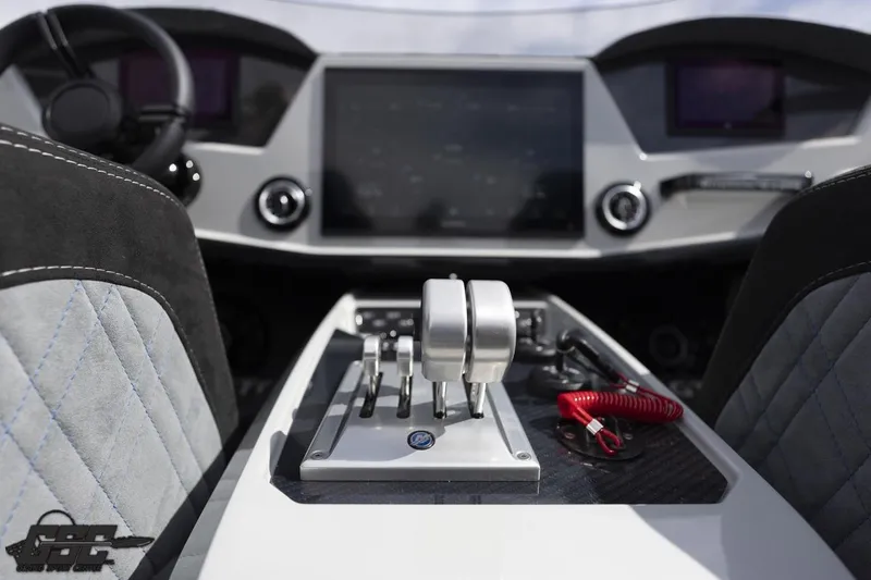 Slide: The Image of 2025 Interceptor 36 GTC cockpit with modern controls and sleek dashboard design. - 60