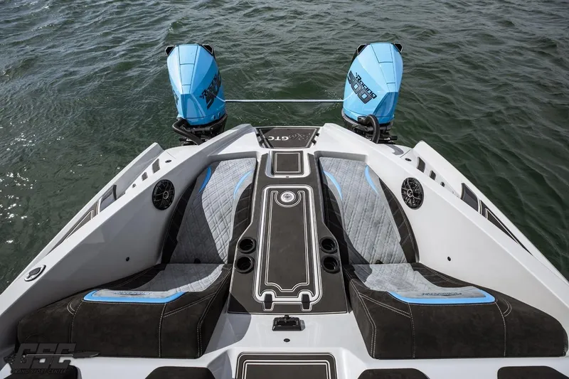 Slide: The Image of 2025 Interceptor 36 GTC boat with twin outboard engines on water. - 63