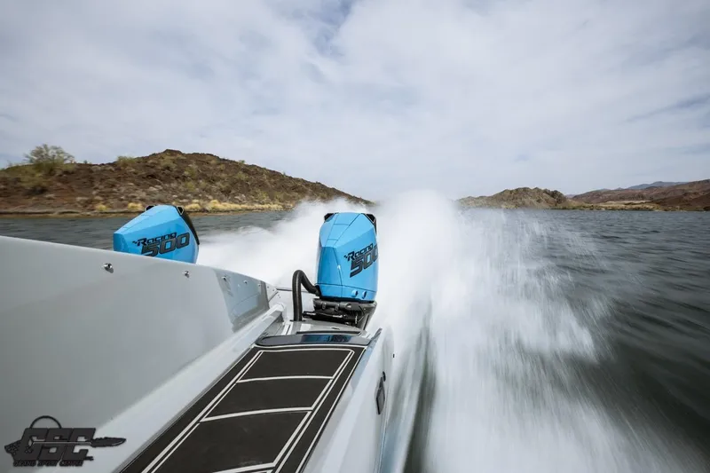 Slide: The Image of High-speed Interceptor 36 GTC boat with twin engines racing on a lake, 2025 model. - 67