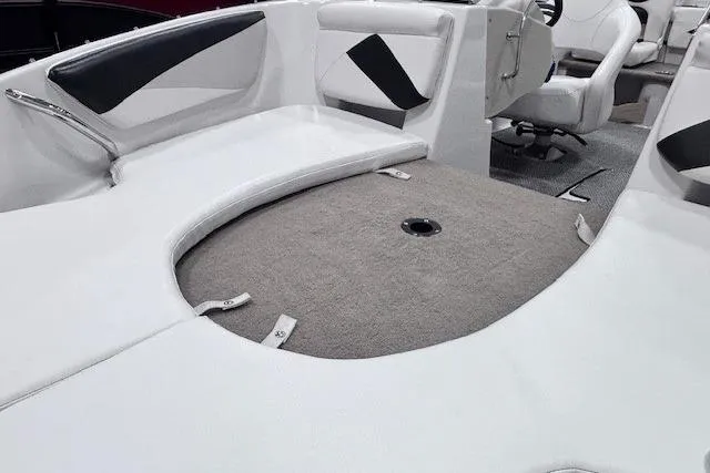 Slide: The Image of 2011 Glastron GT 205 Ski & Fish boat interior with white and gray seating. - 14