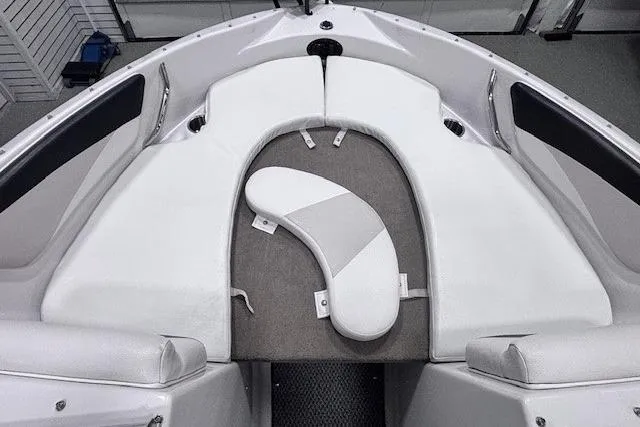 Slide: The Image of 2011 Glastron GT 205 Ski & Fish boat interior with white cushioned seating. - 20
