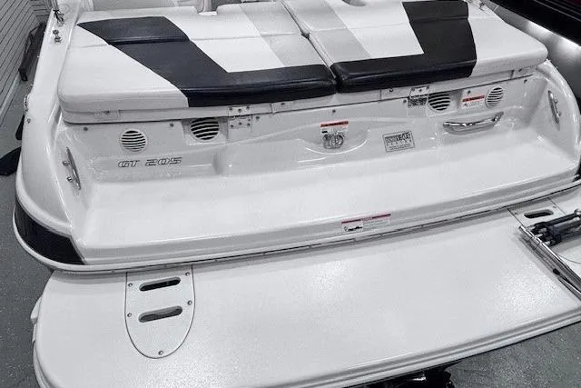Slide: The Image of 2011 Glastron GT 205 Ski & Fish boat, rear view with seating and swim platform. - 23