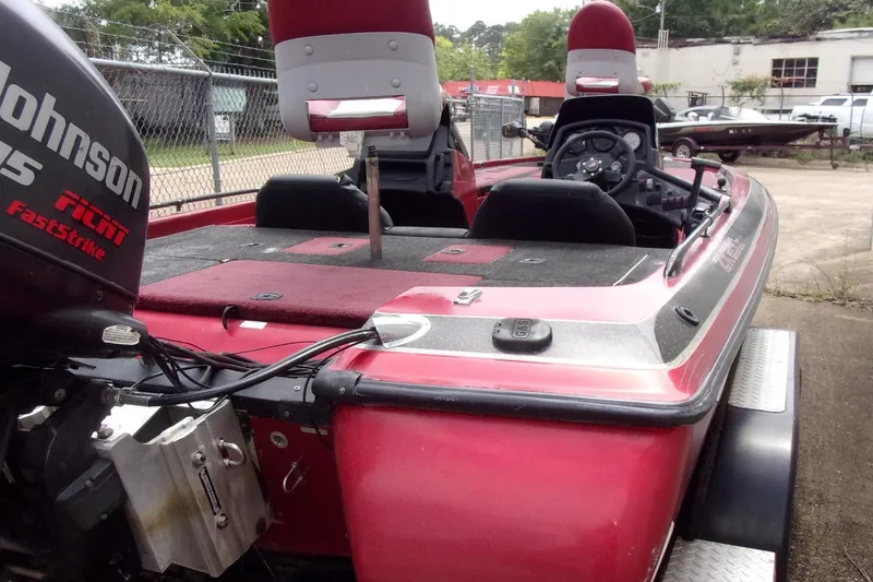 Slide: The Image of 1996 Skeeter ZX200 boat with Johnson Faststrike engine, red interior, and dual seats. - 14