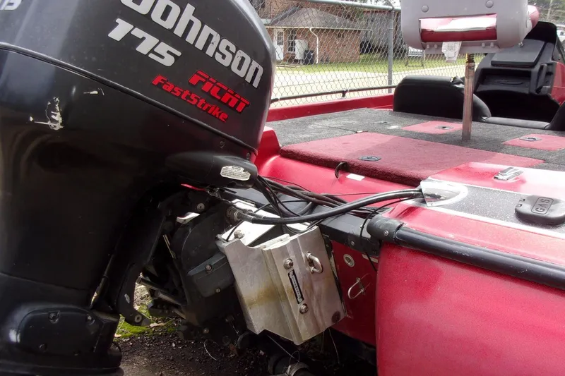 Slide: The Image of 1996 Skeeter ZX200 boat with Johnson 175 FastStrike outboard motor, red deck visible. - 4