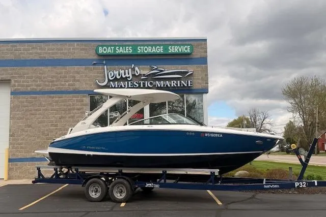 The Image of 2022 Regal LS6 Surf boat on trailer at Jerry's Majestic Marine dealership. - 0