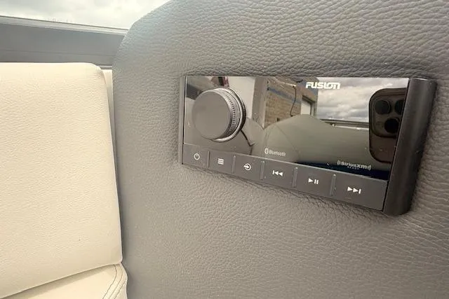 Slide: The Image of Fusion audio system in 2022 Regal LS6 Surf boat interior. - 12
