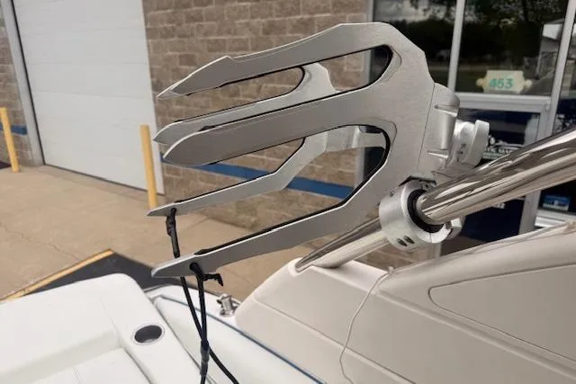 Slide: The Image of Wakeboard rack on 2022 Regal LS6 Surf boat, mounted on a sleek metal frame. - 21
