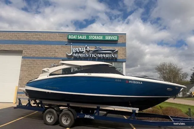 Slide: The Image of 2022 Regal LS6 Surf boat on trailer at Jerry's Majestic Marine dealership. - 33