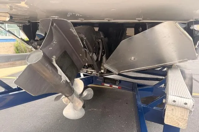 Slide: The Image of 2022 Regal LS6 Surf boat propeller and hull on trailer. - 35