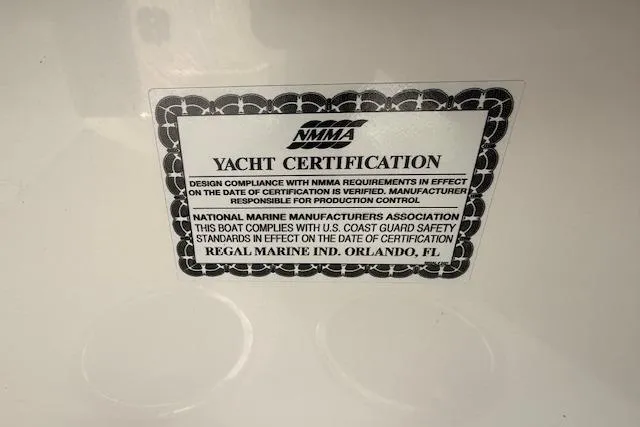 Slide: The Image of Yacht certification label for 2022 Regal LS6 Surf, verifying NMMA compliance and safety standards. - 8
