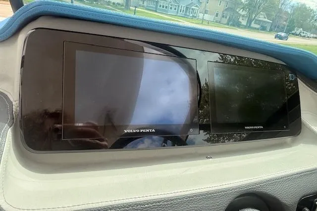 Slide: The Image of Dashboard of 2022 Regal LS6 Surf boat featuring dual Volvo Penta displays. - 9