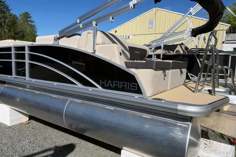 The Image of 2026 Harris Cruiser 190 SL pontoon boat with sleek design and comfortable seating. - 0