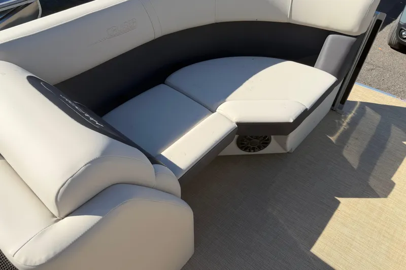 Slide: The Image of 2026 Harris Cruiser 190 SL boat interior with beige and black seating. - 6