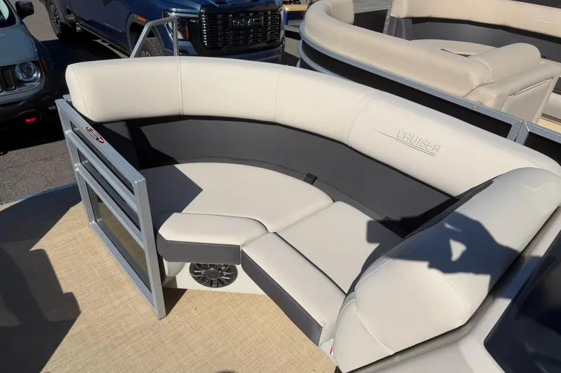 Slide: The Image of 2026 Harris Cruiser 190 SL boat interior with plush seating and modern design. - 7