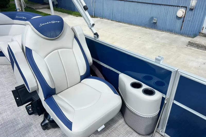 Slide: The Image of Luxurious seating on 2023 South Bay 224 RS pontoon boat with cup holders. - 13