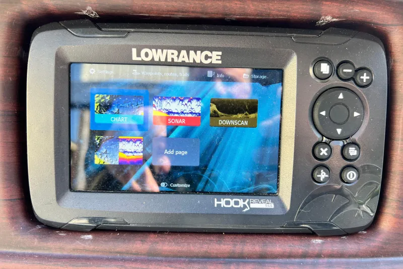 Slide: The Image of Lowrance Hook Reveal fish finder display on 2023 South Bay 224 RS boat. - 15