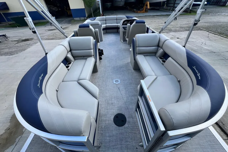 Slide: The Image of 2023 South Bay 224 RS pontoon boat with spacious seating and modern design. - 17