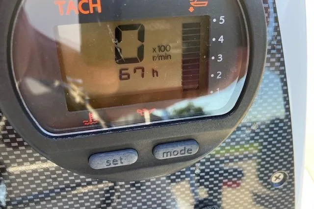Slide: The Image of Tachometer display showing 67 hours on a 2013 AB Inflatables Nautilus 17 boat. - 9