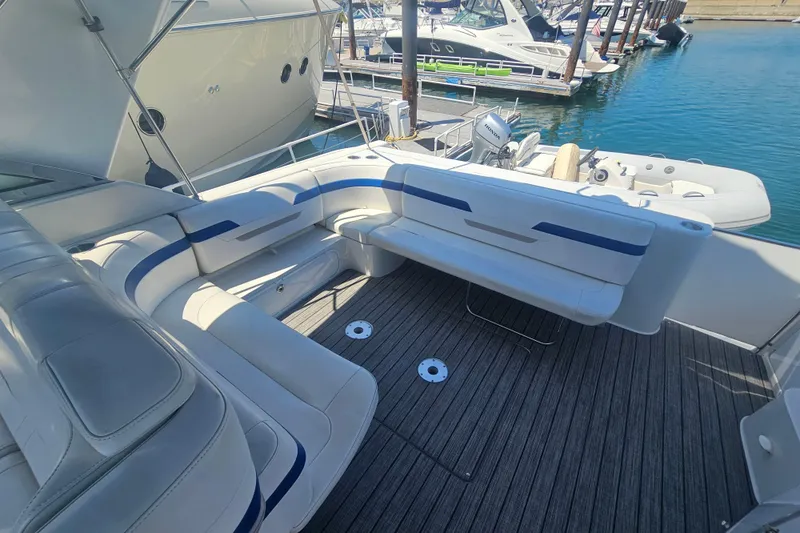Slide: The Image of 2003 Formula 41 Performance Cruiser with spacious seating at marina dock. - 15