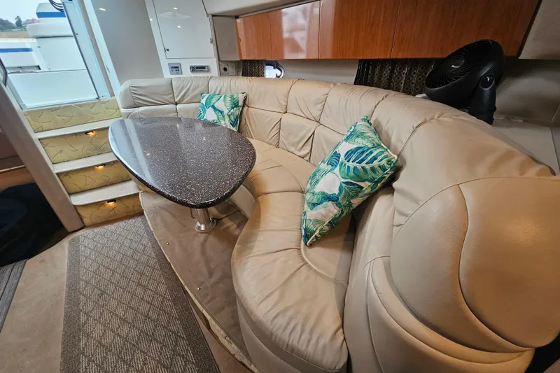 Slide: The Image of Luxurious interior of a 2003 Formula 41 Performance Cruiser with plush seating and elegant decor. - 22