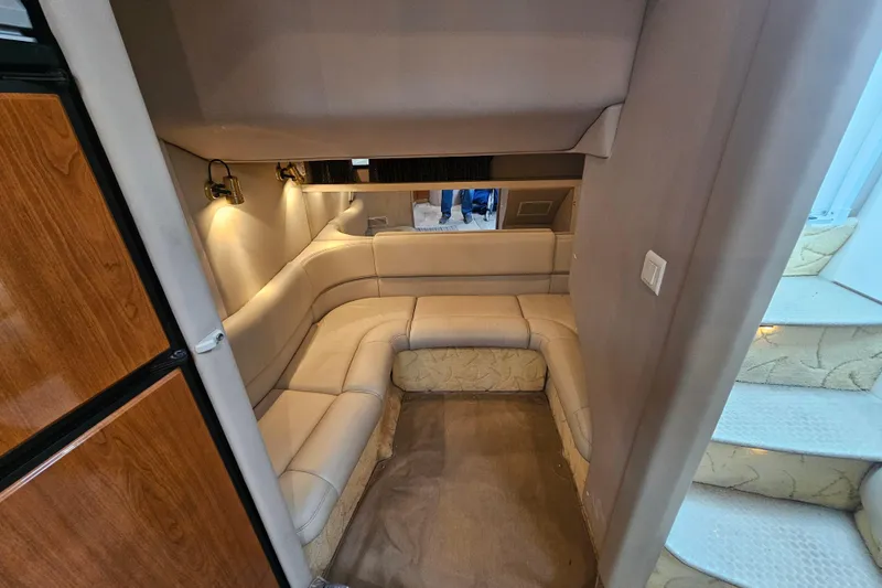 Slide: The Image of Interior of 2003 Formula 41 Performance Cruiser with beige seating and wooden accents. - 28