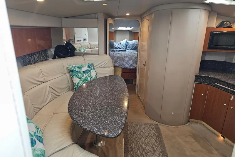 Slide: The Image of Interior of 2003 Formula 41 Performance Cruiser with cozy seating and modern amenities. - 31