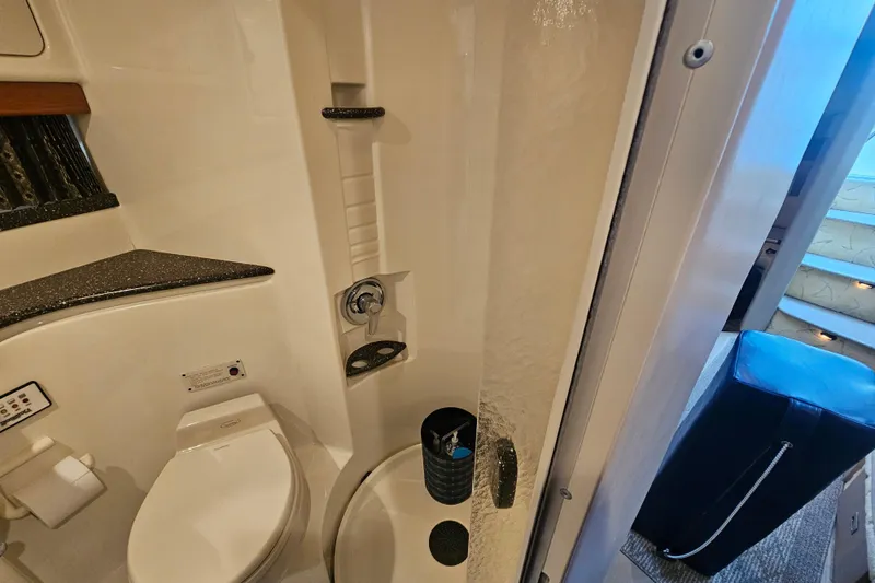 Slide: The Image of 2003 Formula 41 Performance Cruiser bathroom with modern fixtures and compact design. - 35