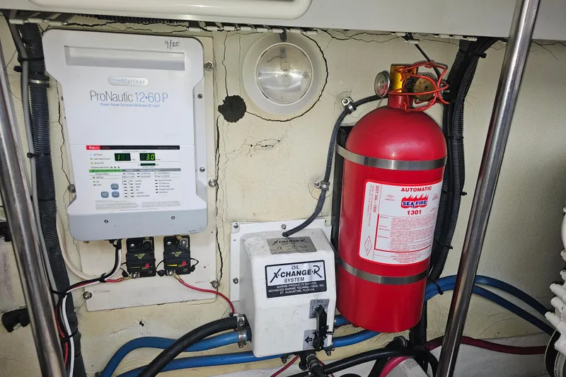 Slide: The Image of Electrical panel and fire extinguisher in 2003 Formula 41 Performance Cruiser engine room. - 38