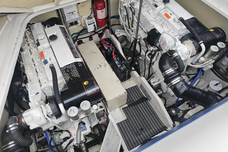 Slide: The Image of Engine compartment of a 2003 Formula 41 Performance Cruiser, showcasing dual engines and components. - 40