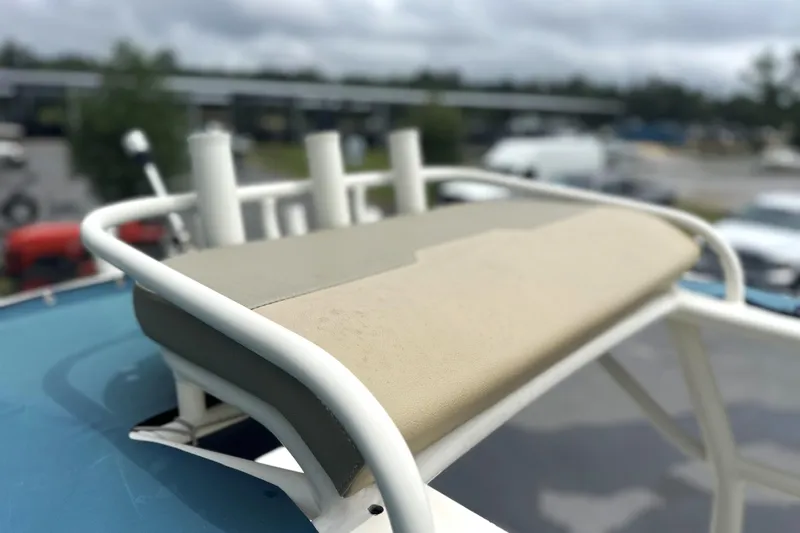 Slide: The Image of 2014 Skeeter SX2250 boat seat with rod holders, outdoor setting. - 15